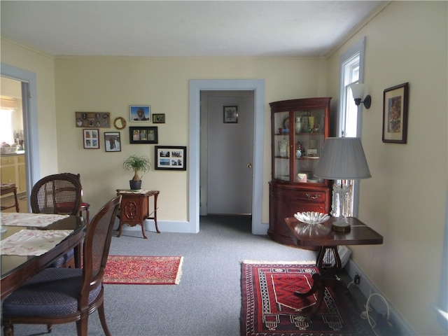 view of carpeted dining area