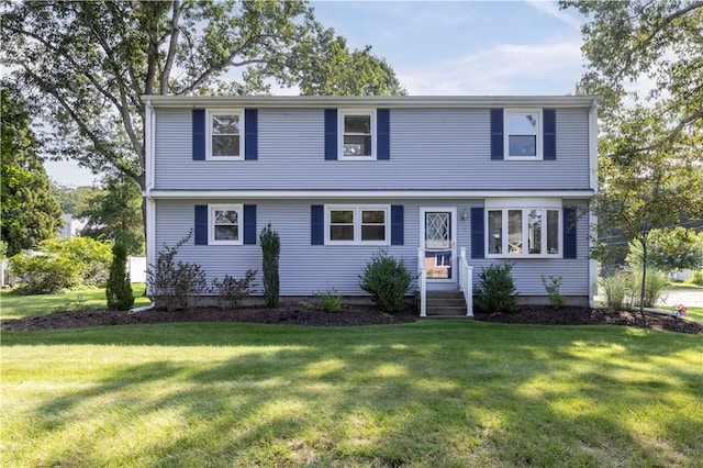 view of front of property with a front lawn