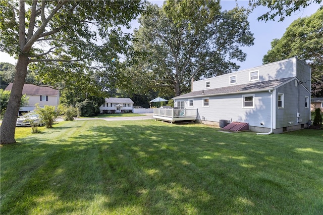 view of yard featuring a deck