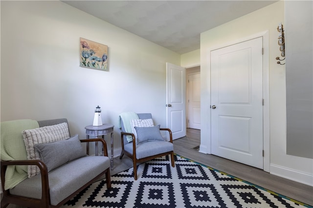 living area with wood-type flooring