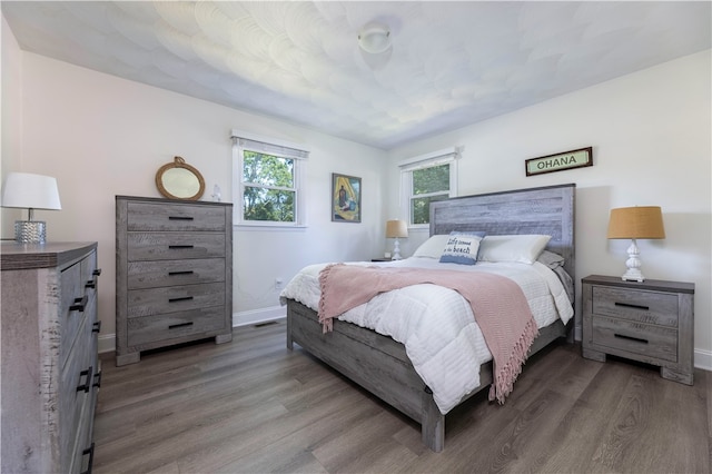 bedroom featuring hardwood / wood-style flooring