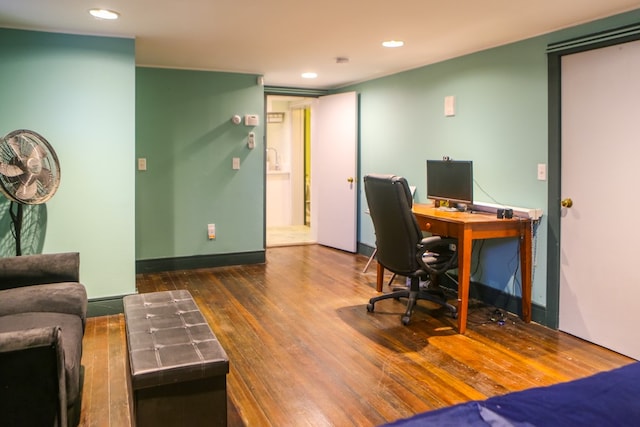 office with dark hardwood / wood-style floors