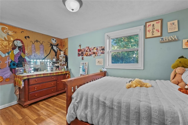 bedroom featuring light hardwood / wood-style floors