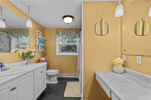 bathroom featuring tile patterned floors, toilet, vanity, and a baseboard heating unit