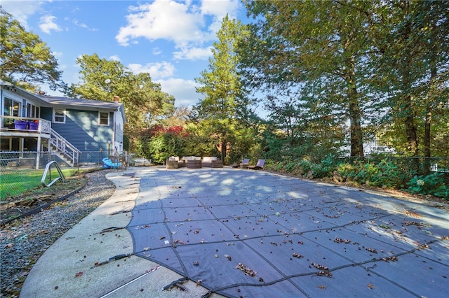 view of pool featuring a patio area