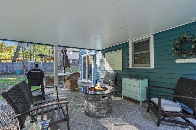 view of patio / terrace with a fire pit