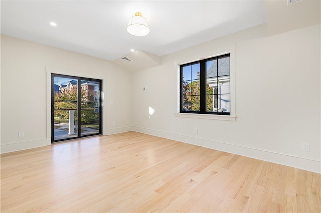 unfurnished room featuring light wood-type flooring