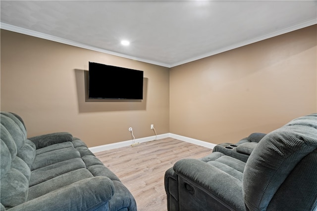 living room featuring ornamental molding and light wood-type flooring