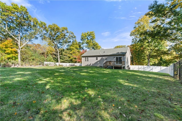 view of yard featuring a deck