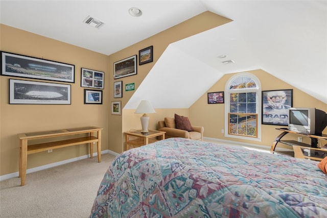 bedroom featuring light carpet and vaulted ceiling