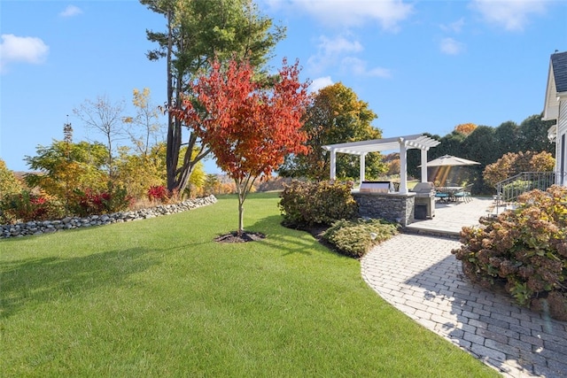 view of yard with a patio and a pergola