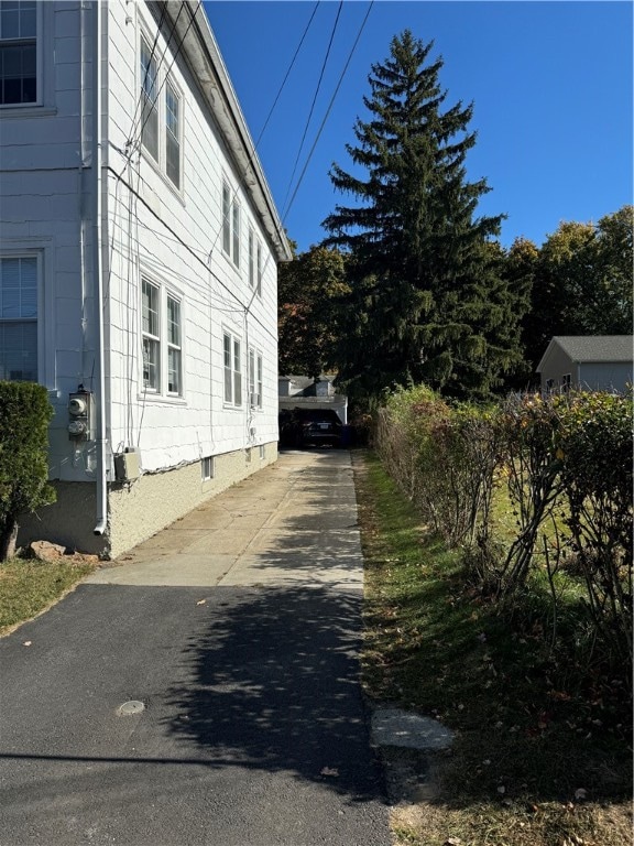 view of home's exterior featuring cooling unit