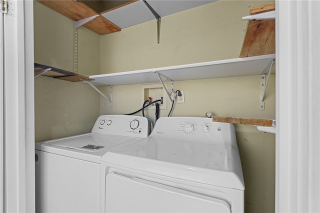 washroom with separate washer and dryer