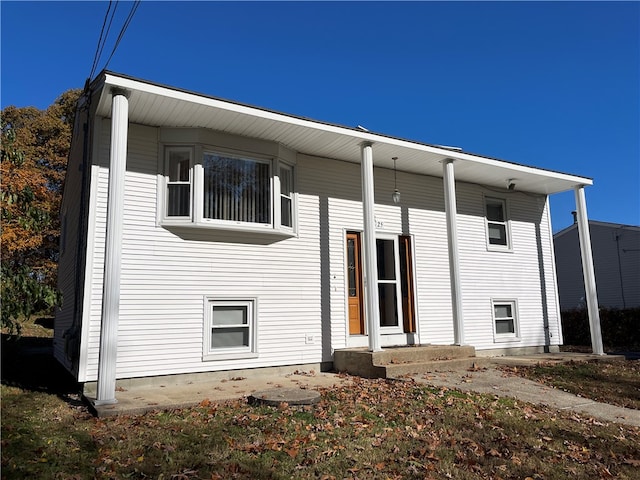 back of property featuring a patio