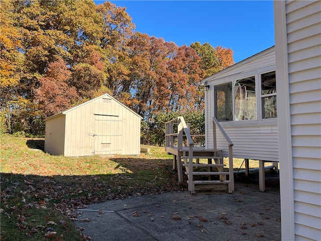 view of patio / terrace featuring a shed