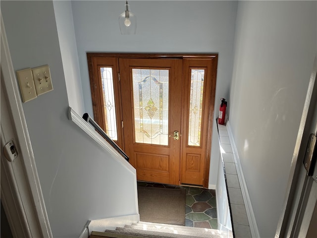 entrance foyer featuring tile patterned floors