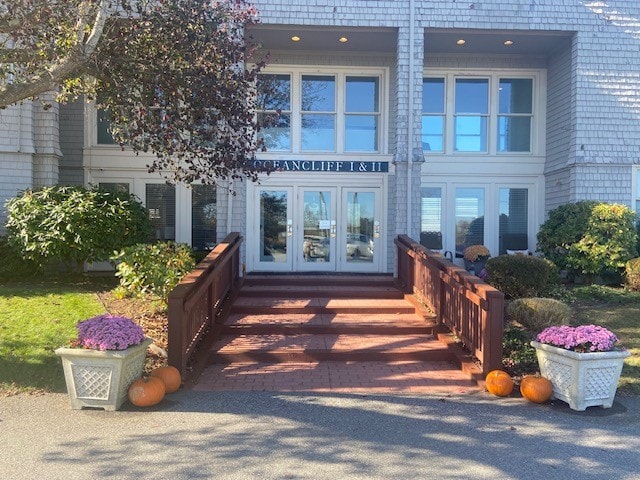 view of exterior entry featuring french doors