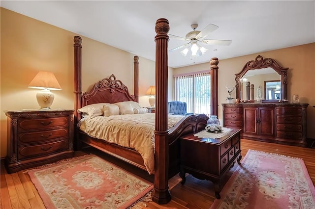 bedroom featuring hardwood / wood-style flooring and ceiling fan