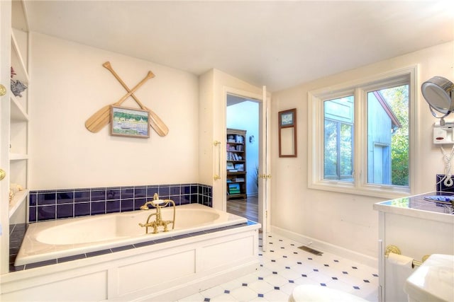 bathroom featuring a tub to relax in