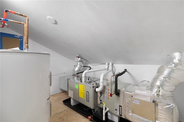 utility room featuring water heater