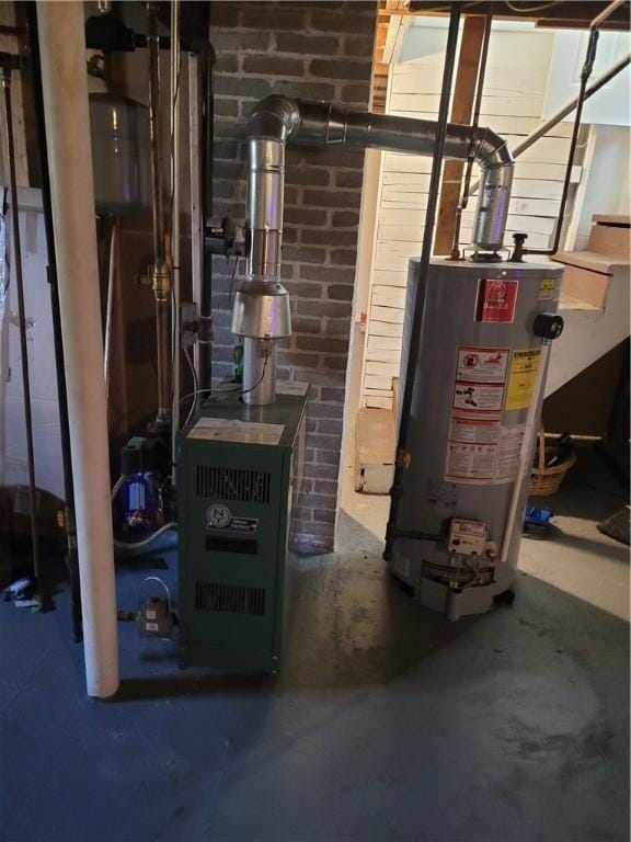 utility room with gas water heater