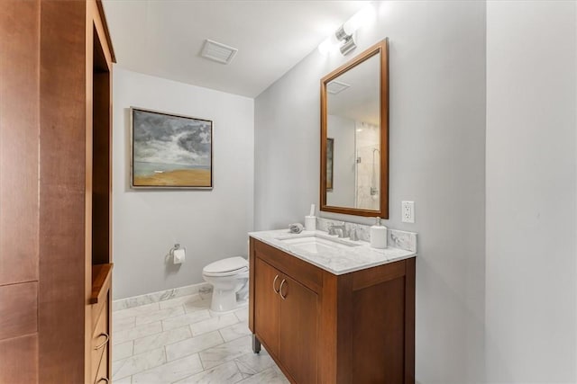 bathroom with toilet, baseboards, visible vents, and vanity