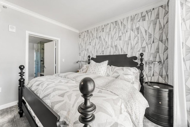 bedroom with baseboards, ornamental molding, and an accent wall