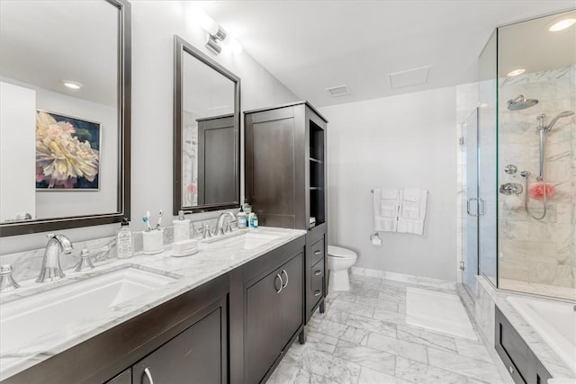 full bathroom featuring toilet, a shower stall, a sink, and marble finish floor