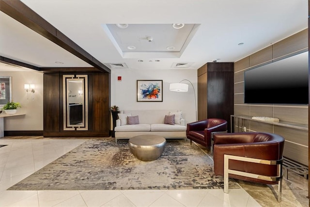 building lobby featuring visible vents