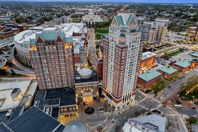 birds eye view of property with a view of city