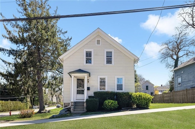 view of front of property with a front lawn