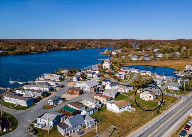 aerial view featuring a water view and a residential view