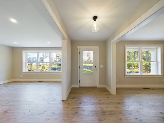 doorway featuring light hardwood / wood-style flooring