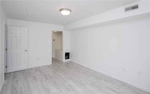 empty room featuring light hardwood / wood-style floors