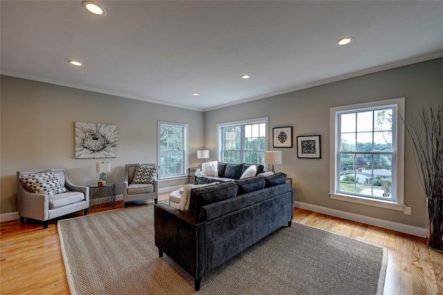 1402 Hunting Hill Dr, Cumberland, RI 02864 - living room featuring light wood-style floors, baseboards, ornamental molding, and recessed lighting