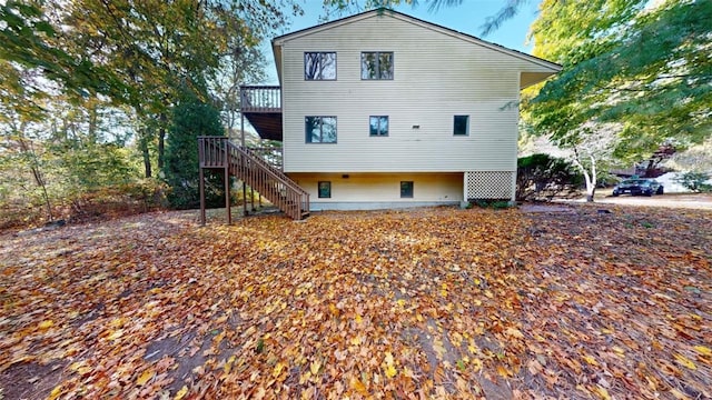 rear view of property with a deck