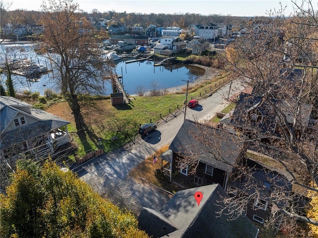 drone / aerial view with a water view