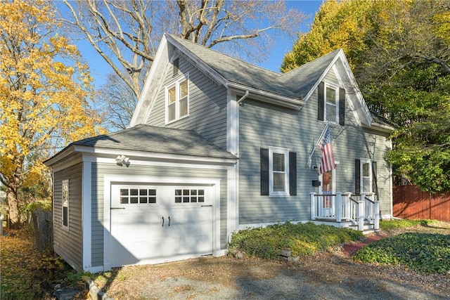 view of side of property featuring a garage