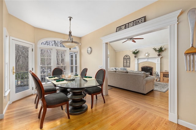 dining room with ceiling fan, light hardwood / wood-style floors, and plenty of natural light