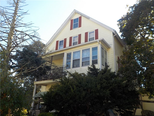 view of property exterior featuring a balcony