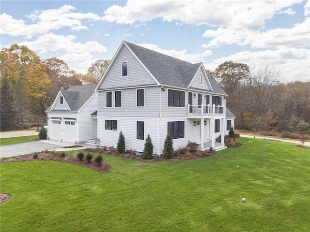 416 Bridgetown Rd, South Kingstown, RI 02874 - view of side of home featuring roof with shingles, an attached garage, a balcony, a lawn, and driveway