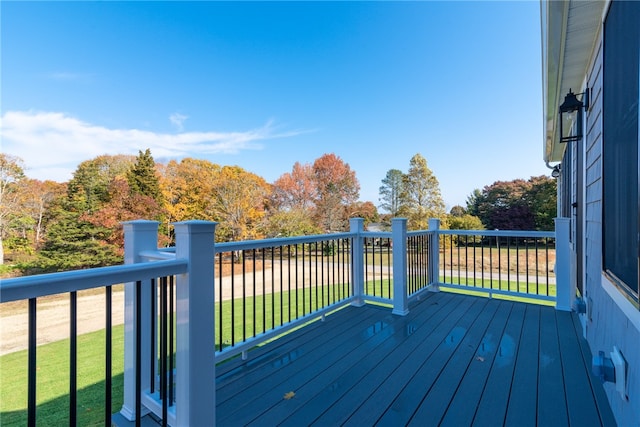 wooden deck with a yard