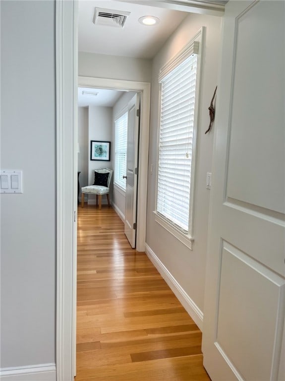 hallway featuring light hardwood / wood-style floors