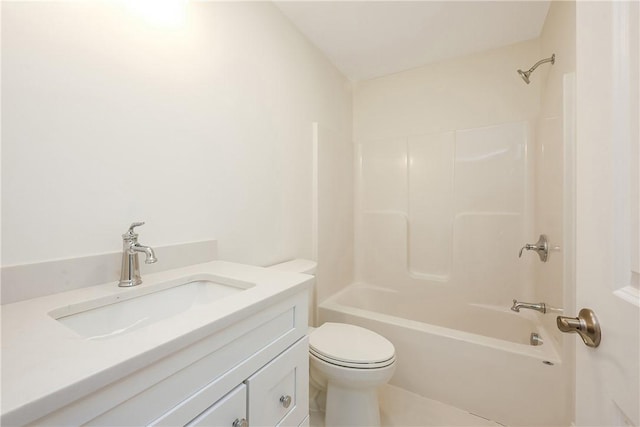 full bathroom with toilet, vanity, and  shower combination