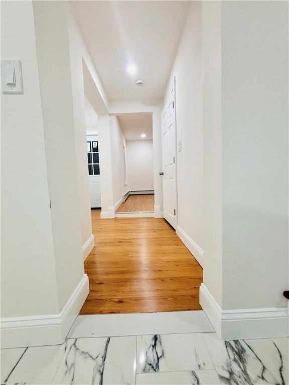 corridor featuring light wood-type flooring