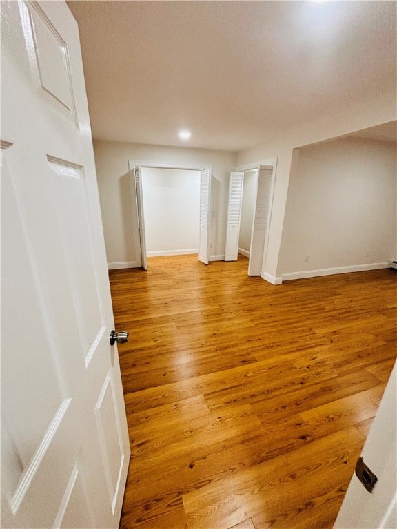 empty room with light wood-type flooring