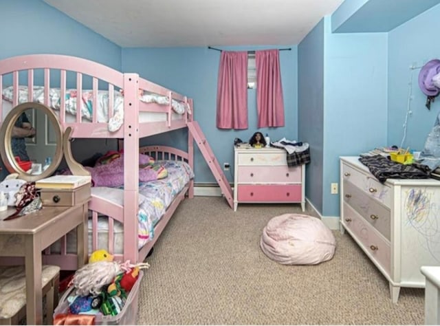 bedroom featuring light carpet