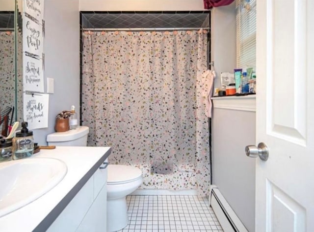 bathroom with tile patterned floors, vanity, curtained shower, a baseboard radiator, and toilet