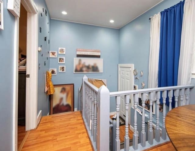 hallway featuring hardwood / wood-style floors