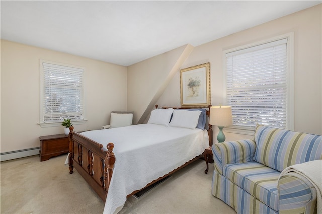 bedroom with baseboard heating and light colored carpet